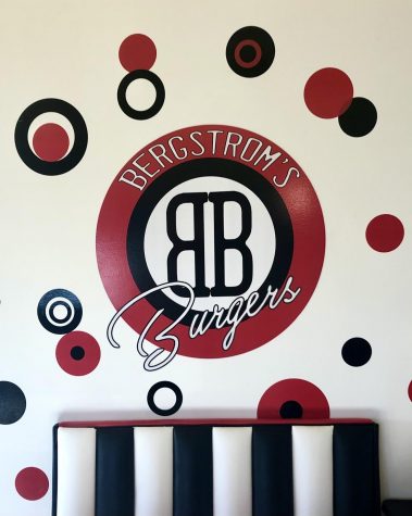 Bergstroms Burgers diner-themed wall and logo in the restaurant on US-31. 