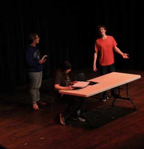 Junior Coby Sipple, sophomore Jada Stewart, and senior Xander Shumaker rehearse for Young Playwrights at the City Opera House.