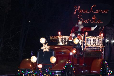 Once the Santa Clause truck reaches the final destination, the town Christmas Tree, Santa lights the tree to commence the beginning of the holiday season.