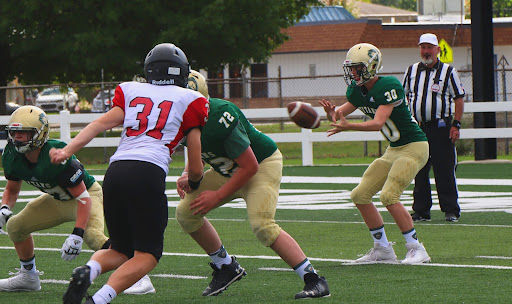 Freshman player Henry Olson featured playing against Grand Blanc on Sept. 14. Photo credit: S. Fleming/I. Wien