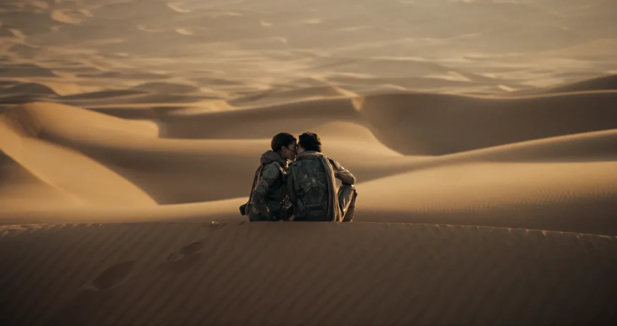 Dune scene of Chalamet and Zendaya. Photo Credit: Warner Bros Pictures 