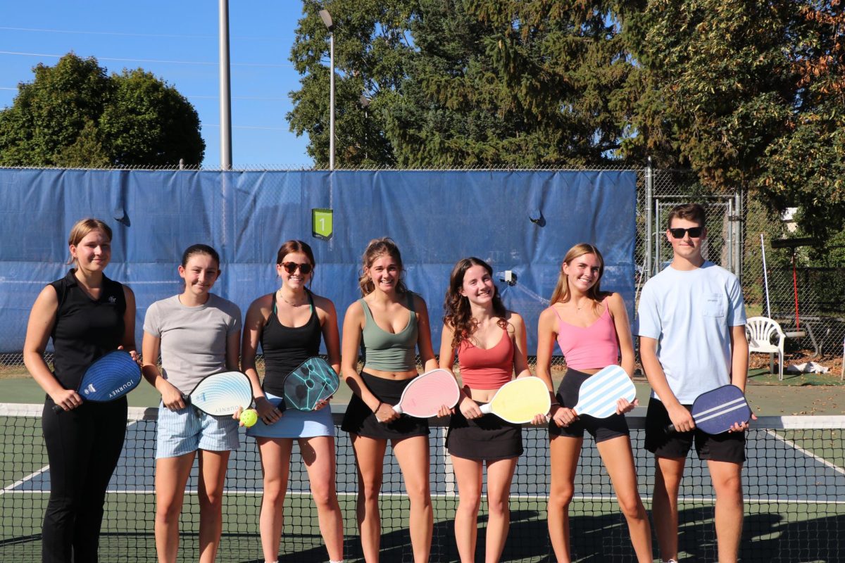 Pickleball Club members pose for a group photo at their first meeting. Photo Credit: Henry Stachnik