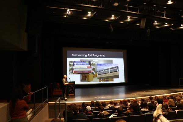 Financial aid presentation in the auditorium. Photo Credit: M. Bildeaux