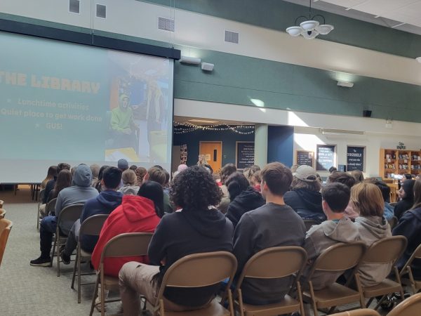 Future high-schoolers watch a presentation in the LMC during their student-led tour of the high school. Photo Courtesy: E. Maniaci
