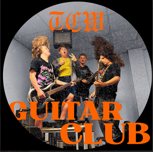 One contingent of the Guitar Club flexes their instruments and energy. From left: Tyler Affolder, ‘29, Ethan Stein, ‘29, Connor Broge ‘28, Adam Millner, ‘28.