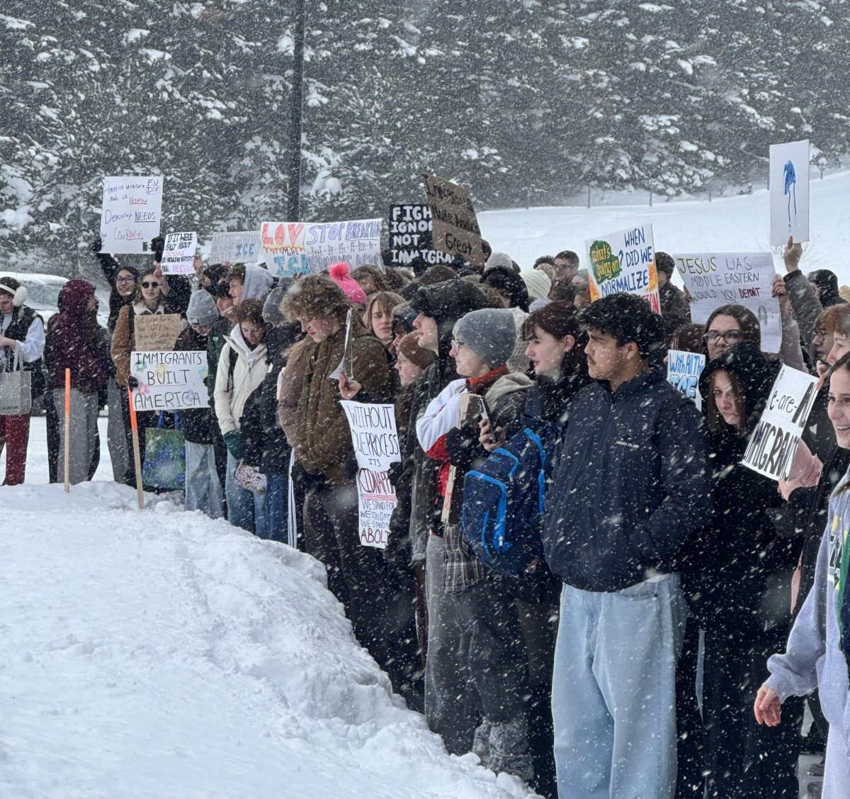 Student protesters with their signs outside of the school building, Jan 30.