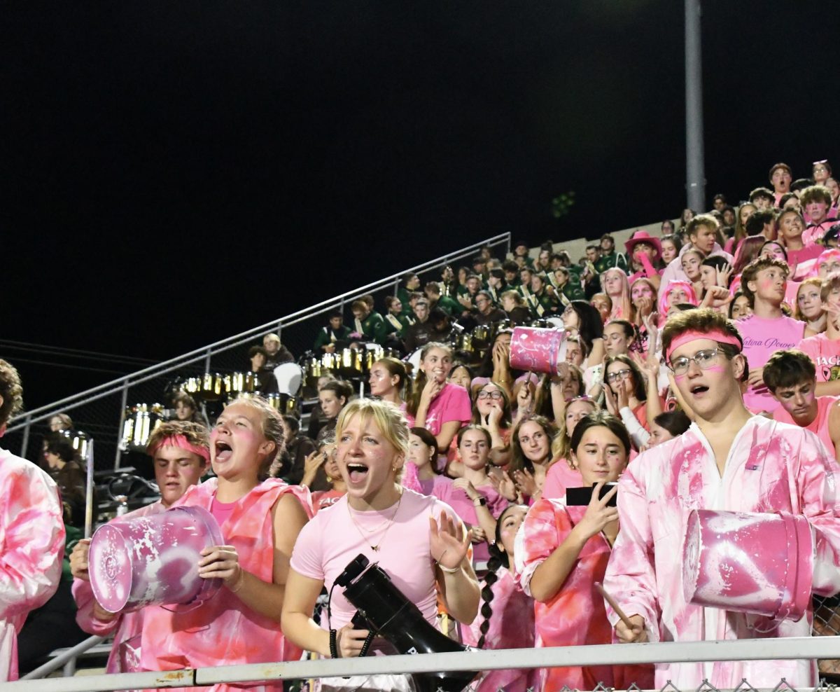 Addie DeGood leads the students sections at West's annual Pink football game
Photo Courtesy: Addie DeGood
