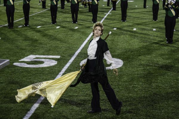 Duggar performs on the field during a halftime show. Photo Courtesy: Email Duggar